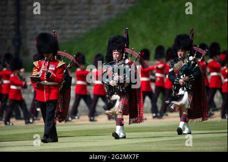 Members of the Massed Band of the Household Division during a ceremony at Windsor Castle in Berkshire to mark the official birthday of Queen Elizabeth II. Picture date: Saturday June 12, 2021. Stock Photo