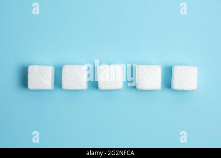 Stack of Sample Cube Rectangular Boxes On Surface Polished With Multi-Colour Stock Photo