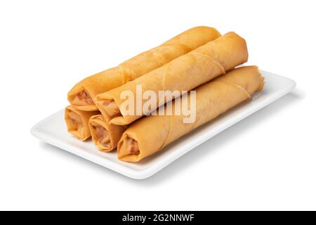 Plate with crispy deep fried Vietnamese egg rolls on white background Stock Photo
