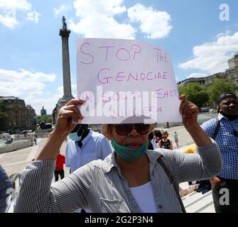 London, England, UK. 12th June, 2021. The pro-Yoruba nation protesters stage a demonstration against Nigeria's President Muhammadu Buhari in central London on Nigeria's new Democracy Day, June 12. Protesters demand self-determination for Yoruba people. Credit: Tayfun Salci/ZUMA Wire/Alamy Live News Stock Photo