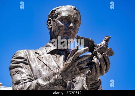 Detail, statue of the poet and playwright Federico García Lorca with a dove in his hands to the take flight. Plaza de Santa Ana, Saint Anne Square, is Stock Photo