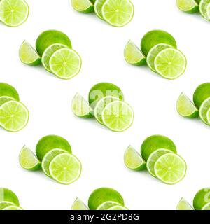 Green limes and lime slices repeat seamless pattern on white background. Stock Photo