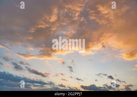 Orange pink evening sky just after sunset - afternoon clouds background Stock Photo