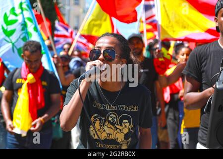 Falmouth, Cornwall, UK. 12th June, 2021. Hundreds of Tigrayan protestors marched through Falmouth to appeal for help from the G7 leaders to draw attention to the looming famine in Tigray, Ethiopia. Credit: Natasha Quarmby/Alamy Live News Stock Photo