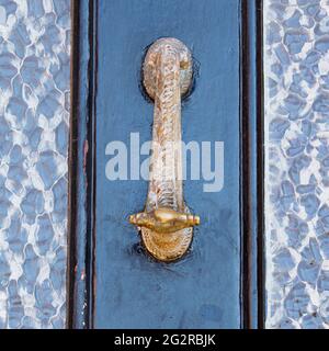 Door knocker on front door in Old Town Hastings, Sussex. U.K. Stock Photo