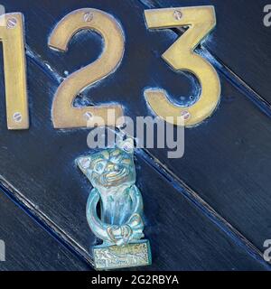 Door knocker on front door in Old Town Hastings, Sussex. U.K. Stock Photo