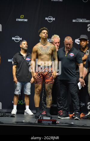 Hollywood, Florida, USA. 11th June, 2021. YouTube personality Austin McBroom poses on the scale during LiveXLive's Social Gloves: Battle Of The Platforms Pre-Fight Weigh-In at Hard Rock Live! in the Seminole Hard Rock Hotel & Casino on June 11, 2021 in Hollywood, Florida. Credit: Mpi10/Media Punch/Alamy Live News Stock Photo