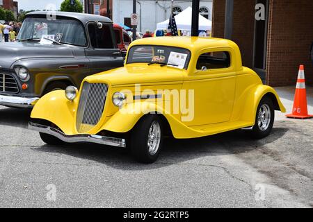 A 1934 Ford 3 Window Coupe on display at a car show. Stock Photo