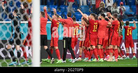 Belgium's players celebrate after winning 3-0 a soccer game between Russia and Belgium's Red Devils, the first game in the group stage (group B) of th Stock Photo