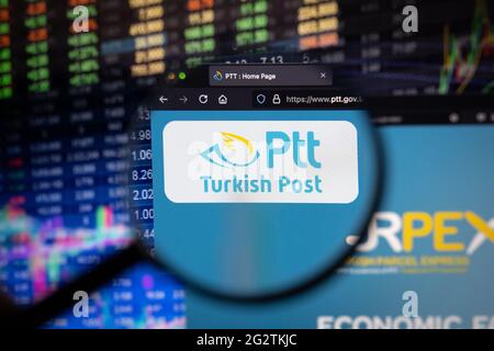 PTT Turkish Post company logo on a website with blurry stock market developments in the background, seen on a computer screen Stock Photo