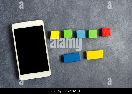 Stack of Sample Cube Rectangular Boxes On Surface Polished With Multi-Colour Stock Photo