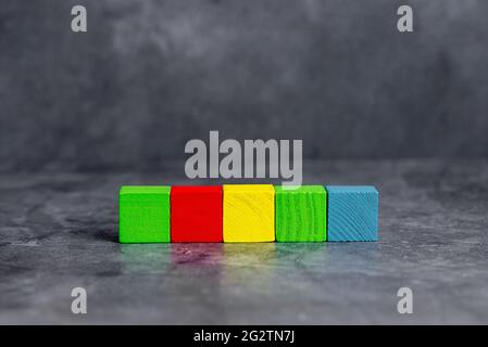 Stack of Sample Cube Rectangular Boxes On Surface Polished With Multi-Colour Stock Photo