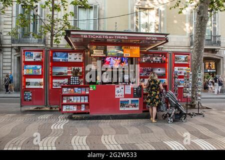 Barcelona, Spain. 12th June, 2021. Woman seen at ticket sales kiosk for tourist events.With the arrival of summer and the opening to tourists in Spain, the beaches and the center of Barcelona, the city begins to return to normality from the summers before the coronavirus pandemic. Credit: SOPA Images Limited/Alamy Live News Stock Photo