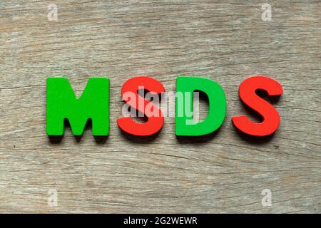 Color alphabet letter in word MSDS (Abbreviation of material safety data sheet) on wood background Stock Photo