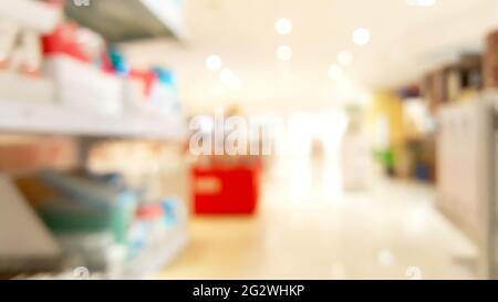 Blur background shopping mall business event in auditorium hall convention audience present display goods products on shelf. Blurry abstract backgroun Stock Photo