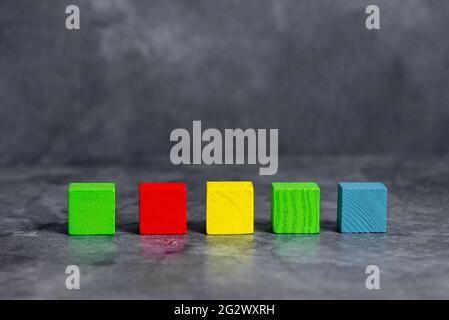 Stack of Sample Cube Rectangular Boxes On Surface Polished With Multi-Colour Stock Photo