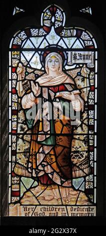 Stained Glass Window by Percy Bacon depicting Saints Anne, Church of the Holy Cross, Burley-on-the-Hill Stock Photo