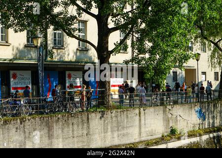 A queue of people at the Corona Test centre at the Deutsches Museum in Munich. Stock Photo