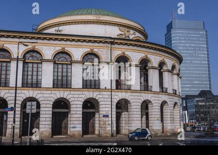 Former Stock Exchange and Bank of Poland building on Bank Square in Warsaw city, Poland, Blue Skyscraper on background Stock Photo