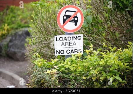 No goods vehicles loading at any time road sign Stock Photo