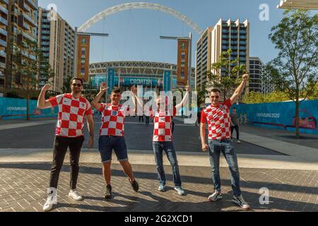 Wembley Stadium, Wembley Park, UK. 13th June 2021.   Croatia fans on Olympic Way early this morning.  Wembley Stadium will host it's first match of the UEFA European Football Championship this afternoon when England play Croatia.  Amanda Rose/Alamy Live News Stock Photo