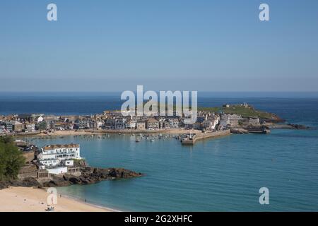 St Ives, UK. 13th June 2021. The sun shines over St Ives on the third and final day of the G7 Leaders' Summit in Cornwall. Credit: Sarah Peters/Alamy Live News Stock Photo