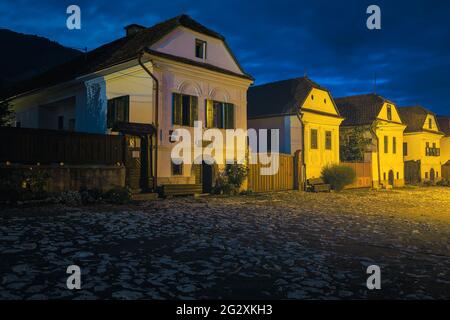 Beautiful dawn scenery with rural houses in the picturesque tranquil street, Rimetea, Transylvania, Romania, Europe Stock Photo