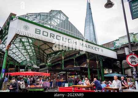 London. UK- 06.10. 2021. A street view of a facade of Borough Market with The Shard in the background. Stock Photo