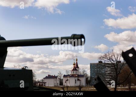 Fragment of a tracked track on a green camouflage tank. Stock Photo