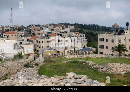 View of the Mount Gerizim with the village of Kiryat Luza, near the city of Nablus  the ancient and biblical town of Shechem. Palestine Stock Photo