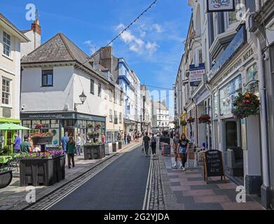 Lined with restaurants and arty shops, Plymouth’s historic Southside Street is happy to welcome back shoppers as lockdown eases in early June 2021 Stock Photo