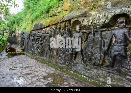 Yeh Pulu rock carvings at Bedulu village, near Ubud. Bali, Indonesia. Stock Photo