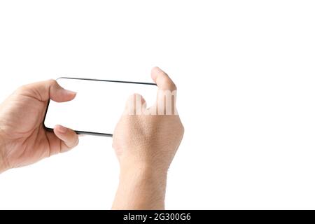 Man hand using smartphone or play game with blank screen, isolated on white background Stock Photo