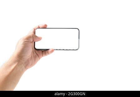 Man hand using smartphone with blank screen, isolated on white background Stock Photo