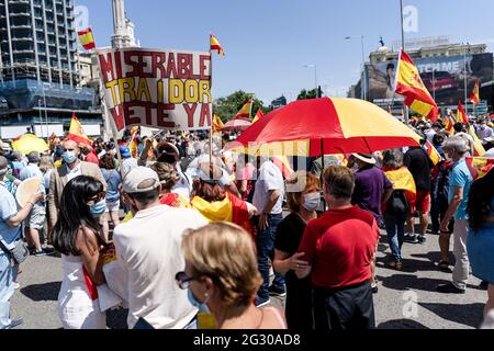 Madrid, Spain. 13th June, 2021. Protesters rally in Colon Square. Thousands of people in Madrid are protesting the Spanish government's plan to issue pardons to separatist leaders who were convicted for their roles in the independence process of 2017. Credit: SOPA Images Limited/Alamy Live News Stock Photo