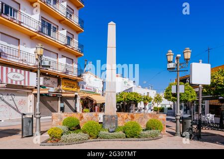 Monolith commemorating the Independence of Torremolinos as a town. Plaza de la Independencia - Independence Square. Torremolinos, Málaga, Costa de Sol Stock Photo