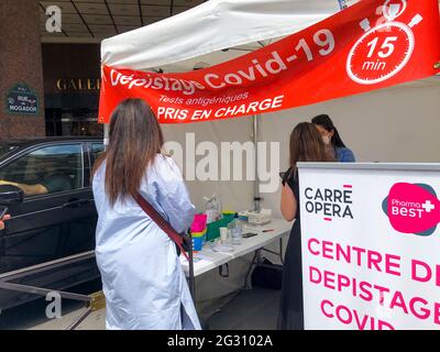 Paris, France, Woman Getting COVID-19 Rapid Test on Street, public health challenges Stock Photo