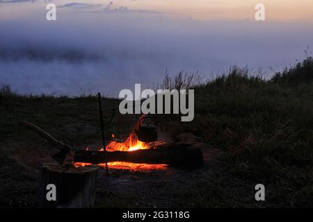 Bonfire on the riverside Stock Photo