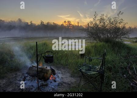 Bonfire on the riverside Stock Photo