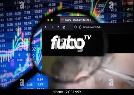 Fubo TV company logo on a website with blurry stock market