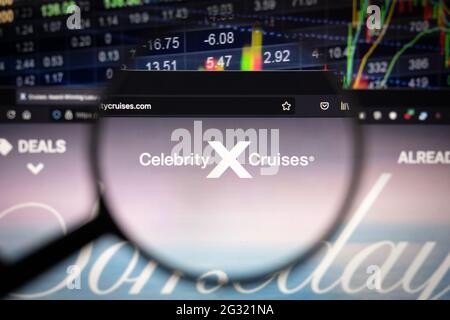 Celebrity Cruises company logo on a website with blurry stock market developments in the background, seen on a computer screen Stock Photo