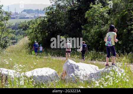 A family walking along a country path Stock Photo