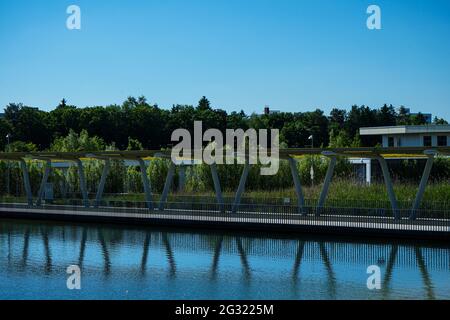 The Campeon (a portmanteau of Campus and Infineon - INTEL) is an office complex embedded in a large public landscape park with water areas. Stock Photo