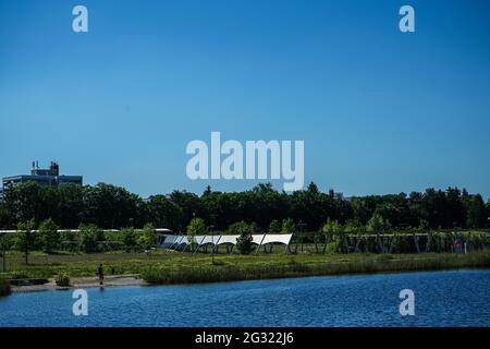 The Campeon (a portmanteau of Campus and Infineon - INTEL) is an office complex embedded in a large public landscape park with water areas. Stock Photo