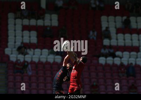 Llanelli, UK. 13th June, 2021. Players contest a lineout as fans watch from the stand. Guinness Pro14 Rainbow Cup match, Scarlets v Edinburgh Rugby at the Parc y Scarlets Stadium in Llanelli, South Wales on Sunday 13th June 2021. pic by Andrew Orchard/Andrew Orchard sports photography/Alamy Live news Credit: Andrew Orchard sports photography/Alamy Live News Stock Photo