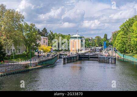 Berlin, Germany - Mai 23, 2021: Spandau locks on the river Havel near the old town of Spandau with its gate and building, connecting the Upper Havel w