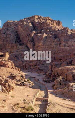 Birdview of ancient dam and bridge in front of the Siq, rock formations, archaeological site of Petra, Jordan Stock Photo