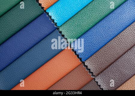 Background image - samples of leather of various colors. Stock Photo