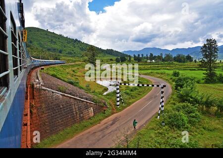 Indian Railways train Kirandul Passenger running through Araku Valley, Andhra Pradesh, India Stock Photo