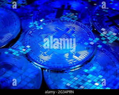 Bitcoin technology background. Blue tone bitcoin and cyber network security, data encryption, cryptocurrency investment concept. Digital future coin c Stock Photo